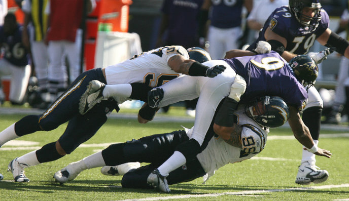 Football player getting tackled